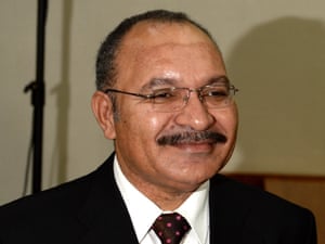 PNG prime minister to co.