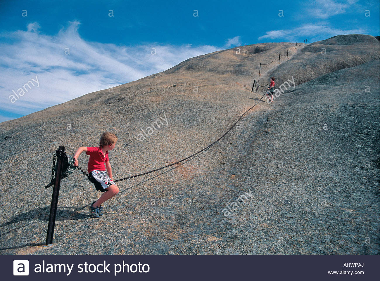 Two 2 young white boys climbing Paarl Rock Paarl West Cape South.