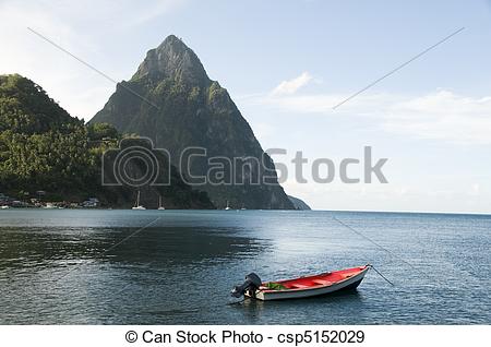 Stock Photographs of Caribbean Sea native fishing boat with view.