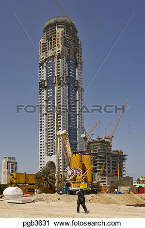 Stock Photography of Tall residential tower block under.