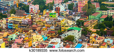 Stock Image of cityscape of colorful homes in crowded Indian city.