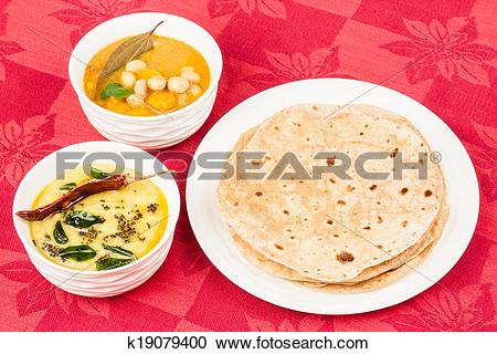 Stock Photography of Chapati with Dal, Vegetable Curry k19079400.