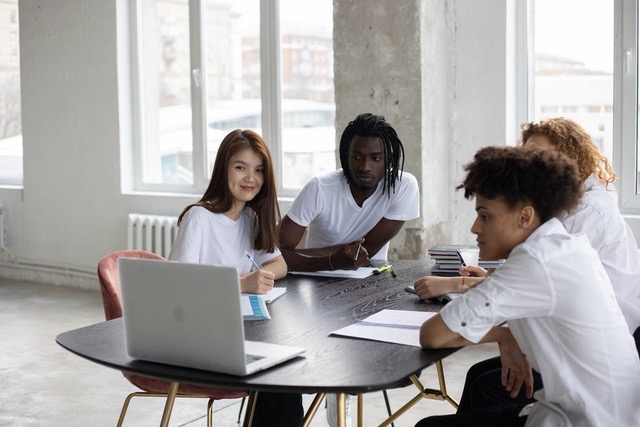 4 Students at a table