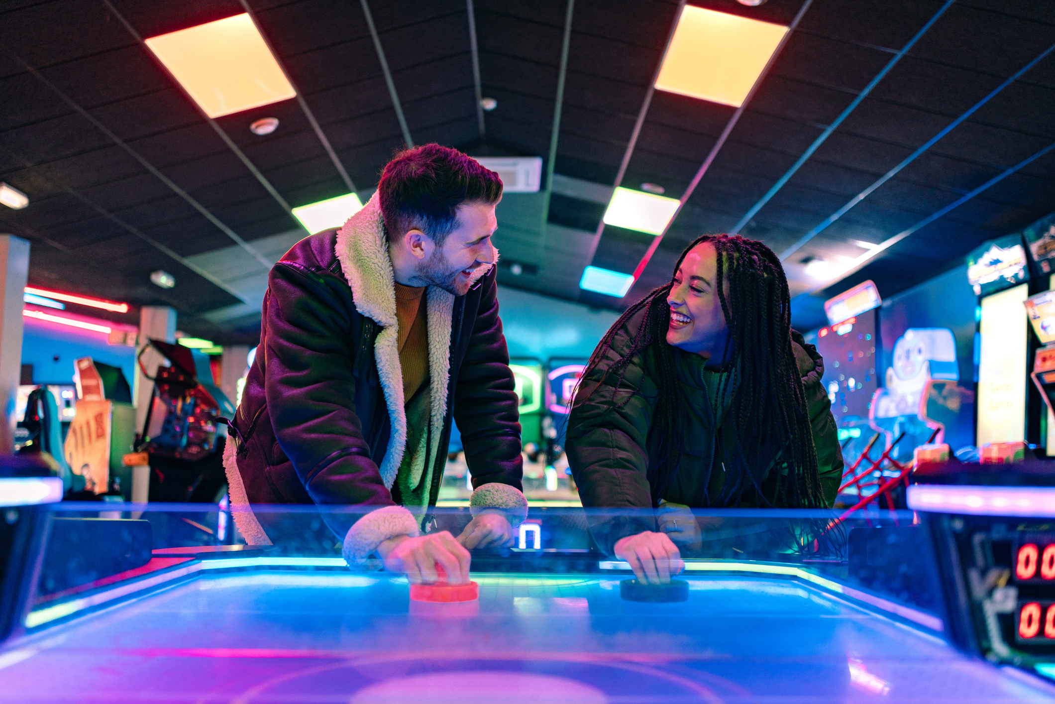 A Man And Woman Playing A Game