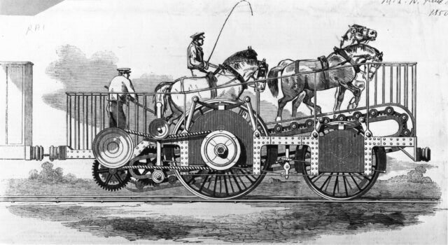 A locomotive featuring four horses climbing an inclined conveyor belt under the supervision of two humans.