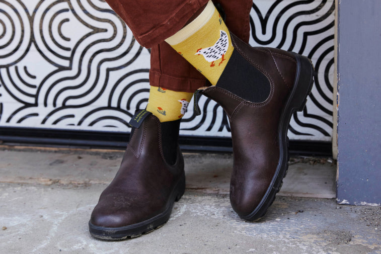 Shop animal socks - feet wearing hiking socks with a husky on them