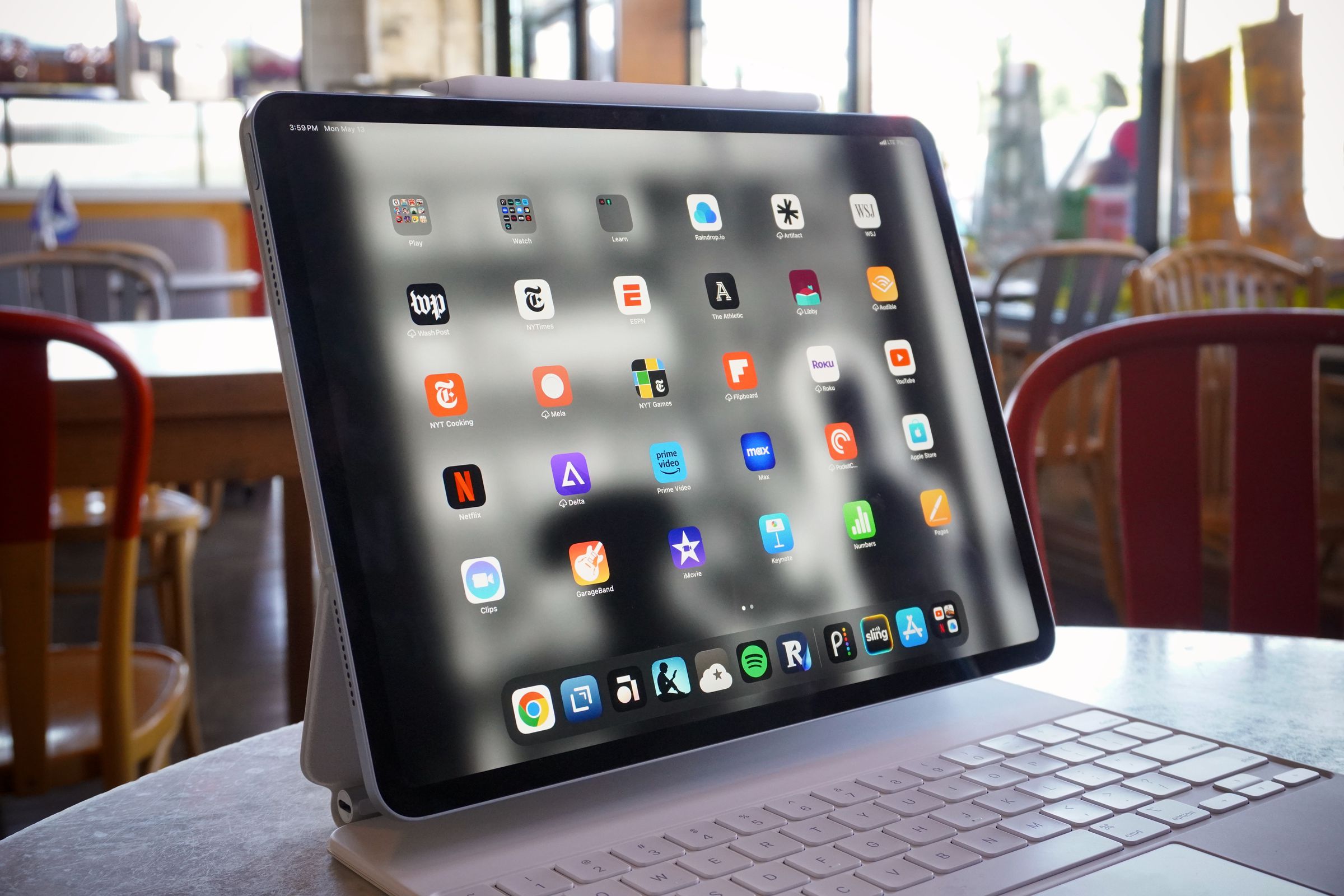 A photo of the iPad Air in a cafe setting.