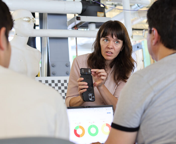 Professor Liz Carter with a prototype