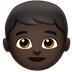 Bagaimana Boy: Dark Skin Tone emoji terlihat di Apple.