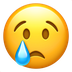 Bagaimana Crying Face emoji terlihat di Apple.