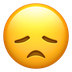 Bagaimana Disappointed Face emoji terlihat di Apple.