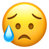 Bagaimana Sad but Relieved Face emoji terlihat di Apple.