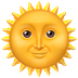 Bagaimana Sun with Face emoji terlihat di Apple.