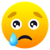 Bagaimana Crying Face emoji terlihat di Joypixels.