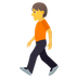 Bagaimana Person Walking emoji terlihat di Joypixels.