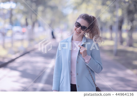 spring, female seasonal portrait / walk happy girl outdoors, spring mood girl 44964136