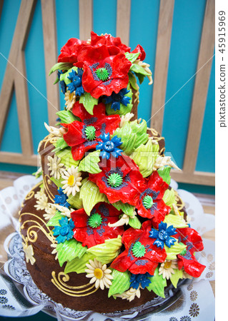 colorful wedding traditional Ukrainian loaf with red poppies, close-up 45915969