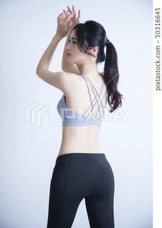 Young woman exercise 50316645