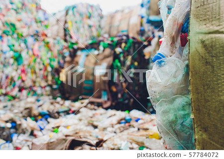 Plastic bales of tetra pak juice packages at waste processing plant. Concept of separate garbage 57784072