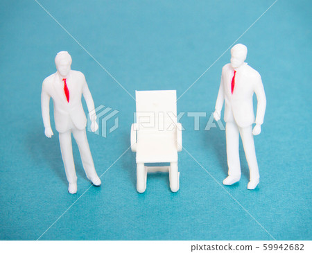 Two managers with red ties are standing near one chair, the concept of vacancy and employment in the workplace, competitors 59942682