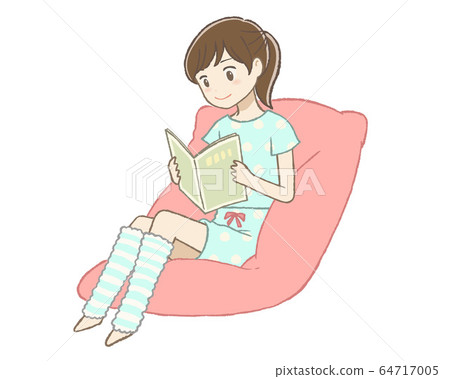 Woman relaxing in the room and reading 64717005