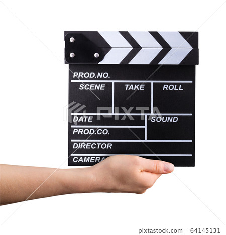 Human hand holding film clapper board isolated on white background 64145131