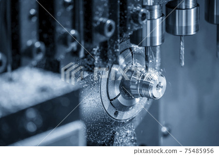 The  operation of multi-tasking CNC lathe machine swiss type tapping on the pipe connector parts.  75485956