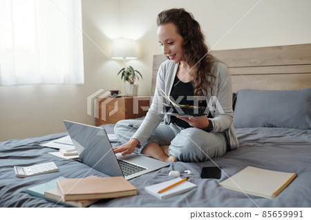 Female Entrepreneur Working from Home 85659991