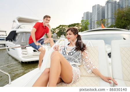 Woman Relaxing on Luxurious Boat 86830140