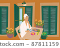 Woman in bathrobe having breakfast at hotel terrace 87811159