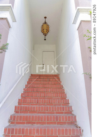 Red bricks doorsteps with pendant light at San Francisco, California 89147926