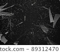 Pieces of shattered glass broken or cracked on black 89312470