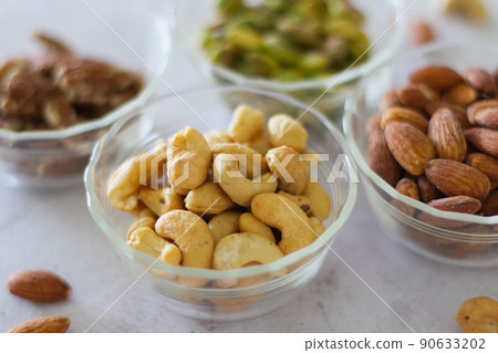 4 kinds of nuts in a bowl 1 90633202