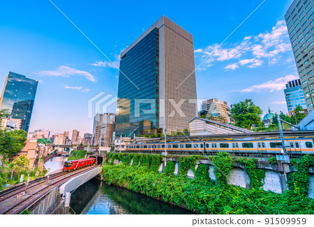 Tokyo cityscape in Japan I want to see Ochanomizu Station and Tokyo Metro Marunouchi Line new model 2000 series that run on the ground section 91509959