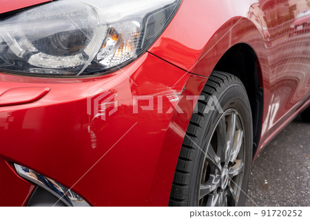 The front part of a damaged car 91720252