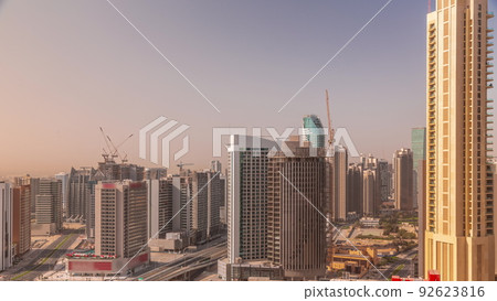 Skyscrapers at the Business Bay in Dubai aerial all day timelapse, United Arab Emirates 92623816