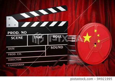 Chinese cinematography, film industry, cinema in China. Clapperboard with and film reels on the red fabric, 3D rendering 94921995