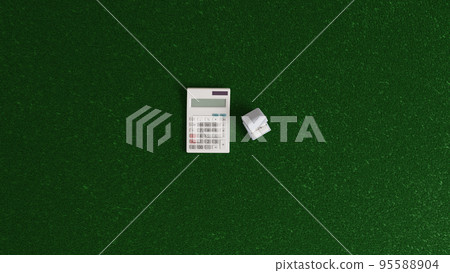 3D rendered illustration of a case containing two wedding rings placed on a flat surface and a white calculator 95588904