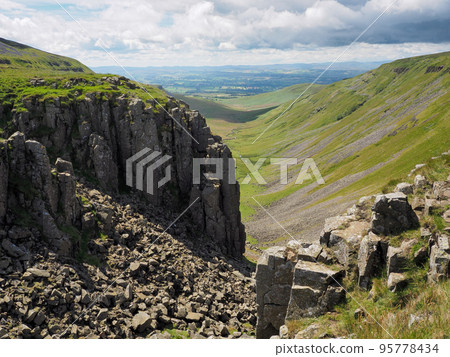 Dramatic view from High Cup Nick of chasm, Eden Valley, North Pennines, Cumbria 95778434