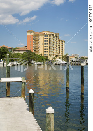 Destin, Florida- Beach house hotel view from a pier across the water 96791432