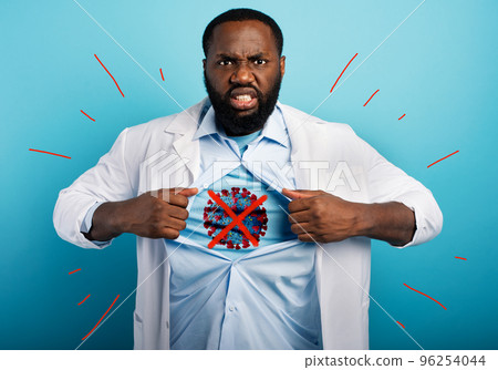 Medic acts like a superhero to fight pandemic of covid19 coronaviruses. Blue background 96254044