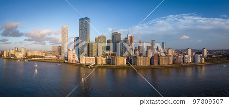 The skyscrapers of Canary Wharf in London on Isle of Dogs - panoramic view 97809507