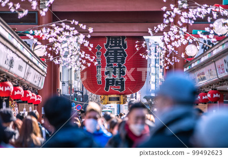 Tokyo cityscape in Japan Senso-ji Temple bustling with foreign tourists. A crowd like before the corona misfortune. No mask required outdoors = February 22 99492623