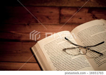 Autumn image of reading (Old book and glasses) 16931783