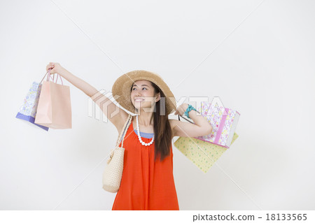 A woman with a shopping bag 18133565