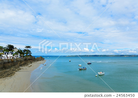 Beach and the boat of Rocky Rock at the summer resort of Brittany 24563450