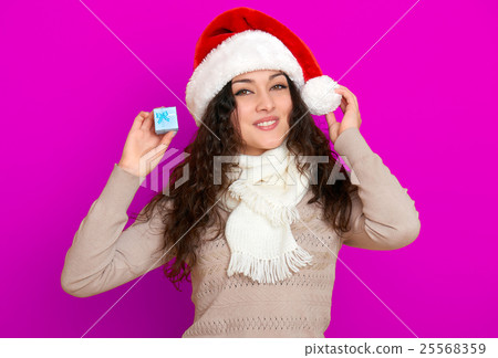 girl in santa hat portrait, christmas holiday 25568359