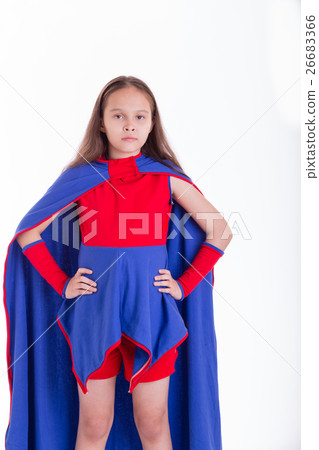 Girl in superhero costume with hands on hips 26683366