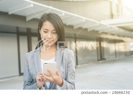 business woman using smartphone 28666230