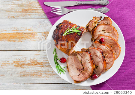 slices of  barbecued in oven turkey roulade 29063340